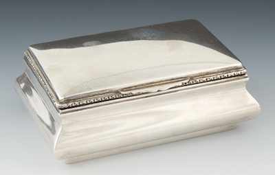 Appraisal: A Sterling Silver Humidor by Camusso Rectangular bombe shape with