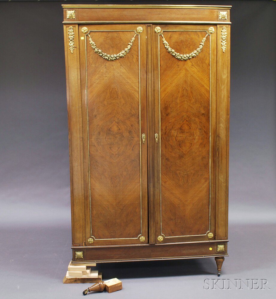 Appraisal: Louis XVI-style Ormolu-mounted Walnut Veneer Armoire the paneled doors with