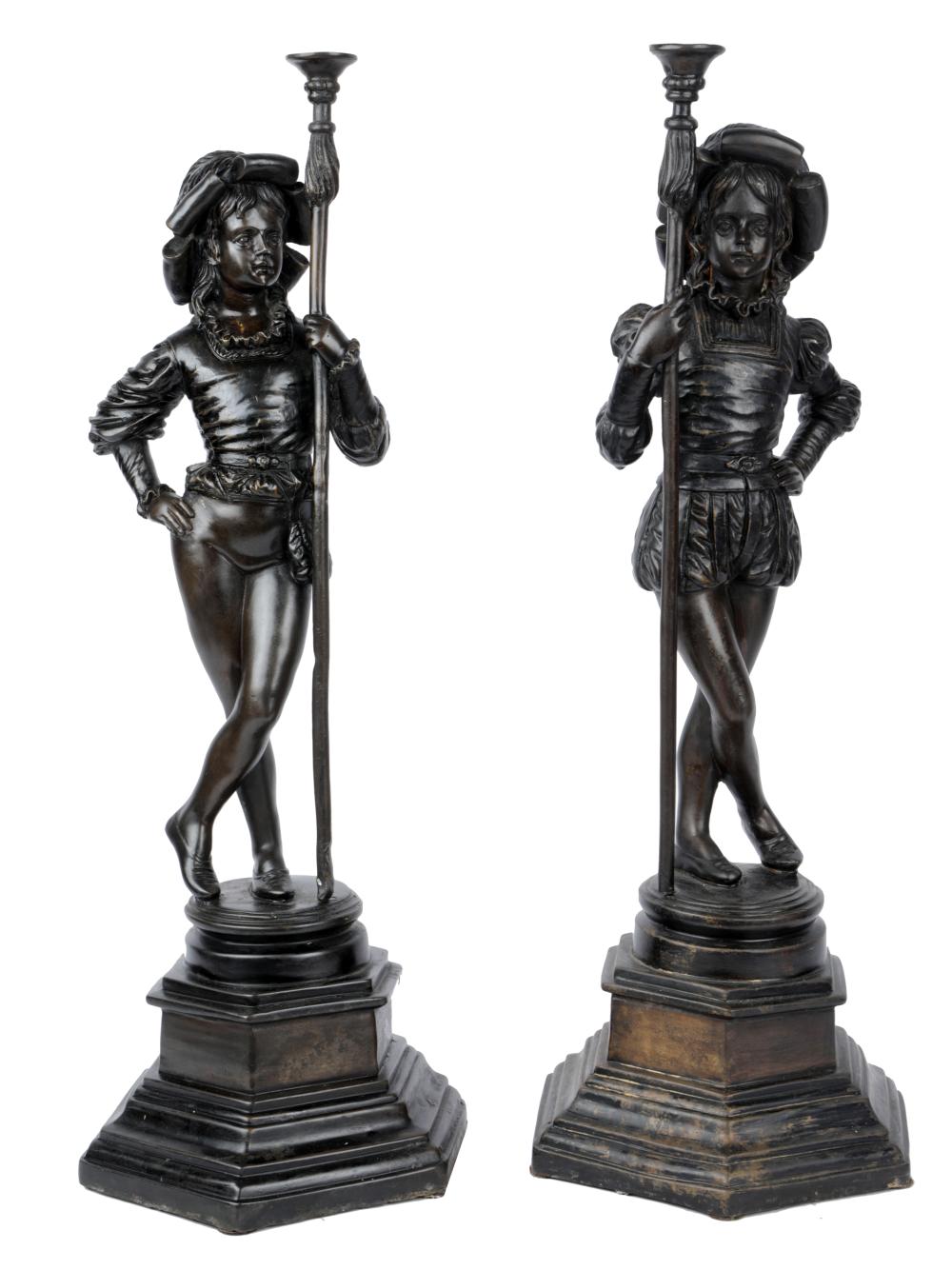 Appraisal: PAIR OF PATINATED METAL FIGURESbronze unsigned each depicting a page