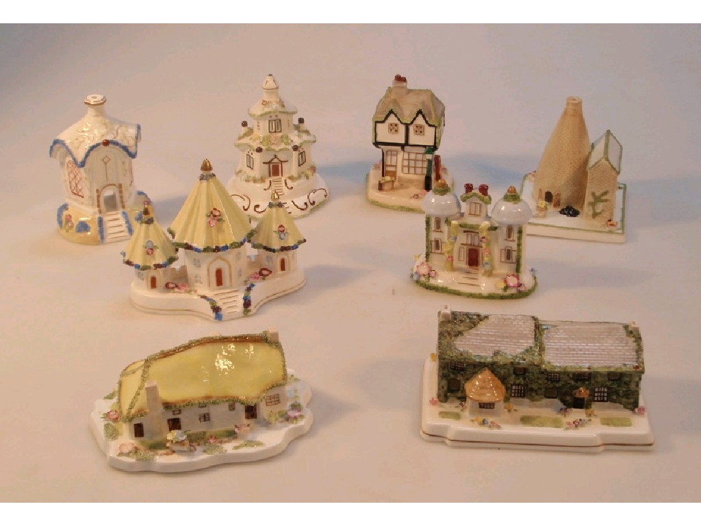 Appraisal: Eight Coalport reproduction pastille burners modelled as buildings including Old