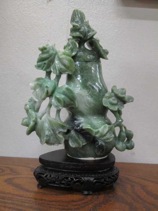 Appraisal: CHINESE CARVED JADE URN on hardwood plinth The lidded double