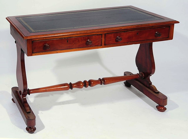 Appraisal: A VICTORIAN MAHOGANY RECTANGULAR LIBRARY TABLE fitted two drawers and