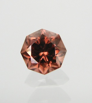 Appraisal: A Natural Color Change Zircon Pinkish-brown color octagonal mixed cut