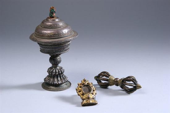 Appraisal: THREE TIBETAN RITUAL OBJECTS th th century Silver butter lamp