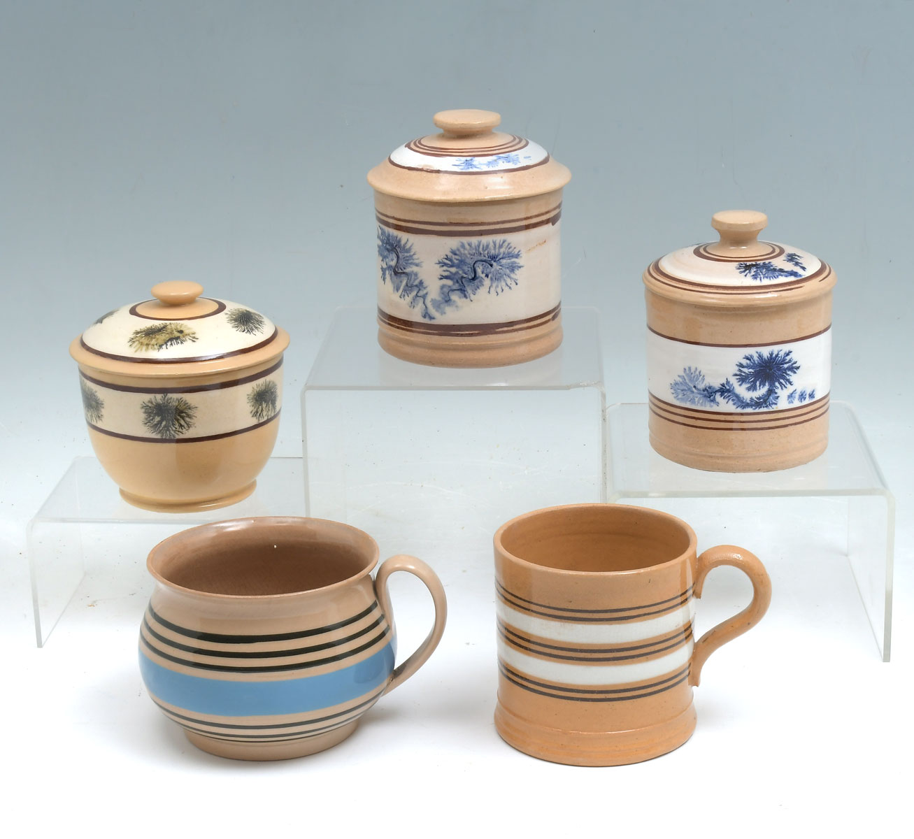 Appraisal: PC EARLY MOCHA YELLOWARE LIDDED JARS MUGS Comprising - Seaweed