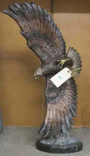 Appraisal: PATINATED BRONZE WILDLIFE SCULPTURE an American bald eagle in flight