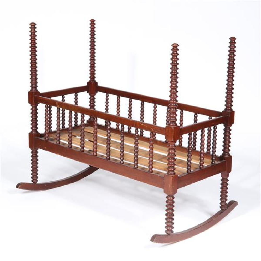 Appraisal: AMERICAN VICTORIAN JENNY LIND STYLE SPINDLE BABY CRADLE American Victorian