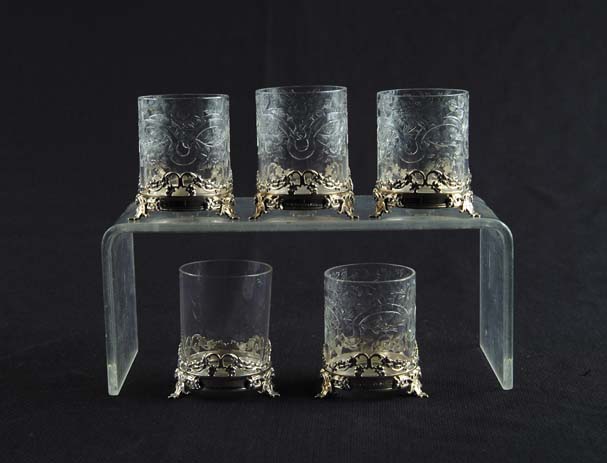 Appraisal: FIVE GLASS STERLING WHISKEY GLASSES Four matching glasses consist of