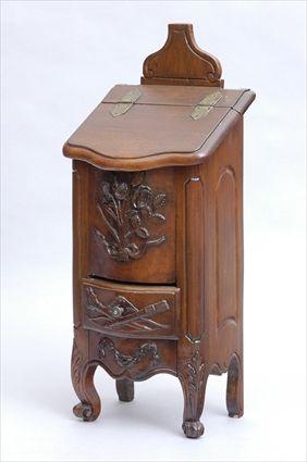 Appraisal: BRITTANY PROVINCIAL CARVED OAK STANDING CANDLE BOX The serpentine-fronted sloping