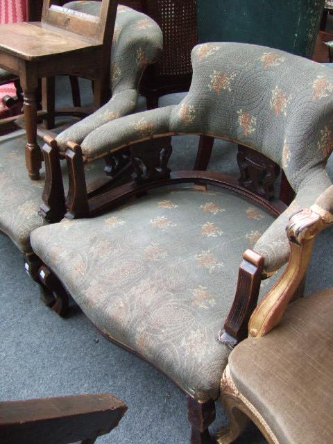 Appraisal: A pair of Victorian mahogany framed tub chairs with triple