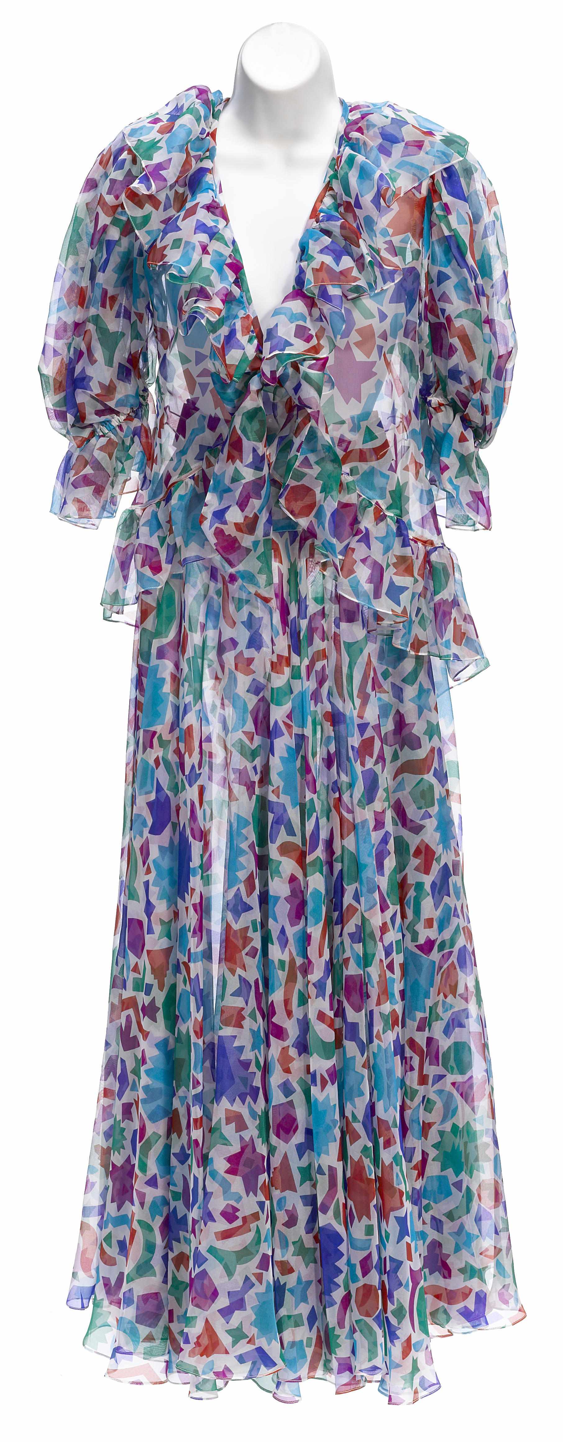 Appraisal: An Yves St Laurent long sheer multicolored gown size together