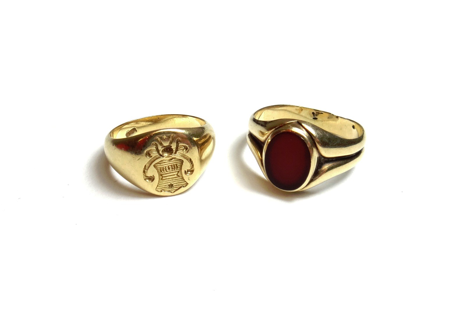 Appraisal: A gold signet ring shield engraved detailed CT ring size