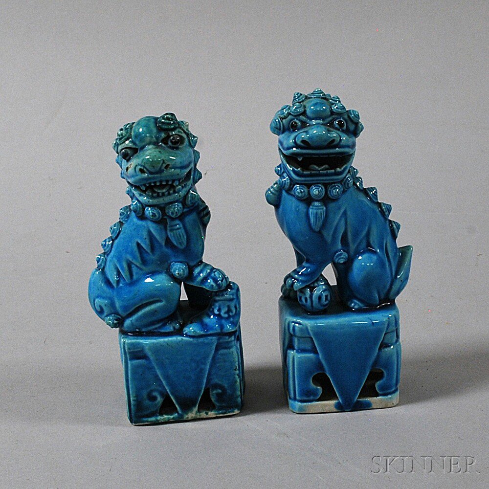 Appraisal: Pair of Chinese Turquoise Glazed Buddhist Lions th century one