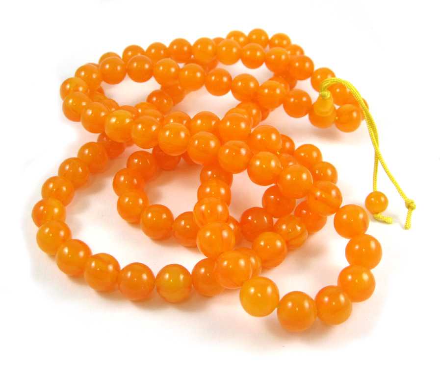 Appraisal: BALTIC PRESSED AMBER PRAYER BEADS measuring inches in length with