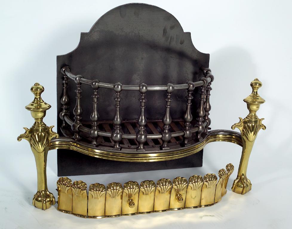 Appraisal: EDWARDIAN BOW-FRONTED STEEL AND BRASS FIRE BASKET with arched fireback