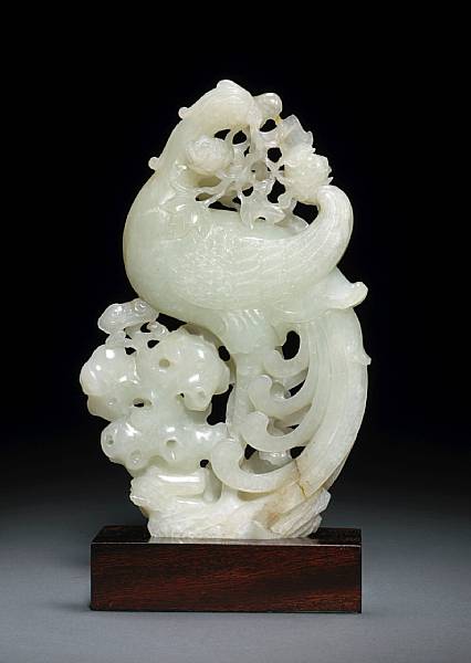 Appraisal: A fine white jade phoenix and garden rock th Century