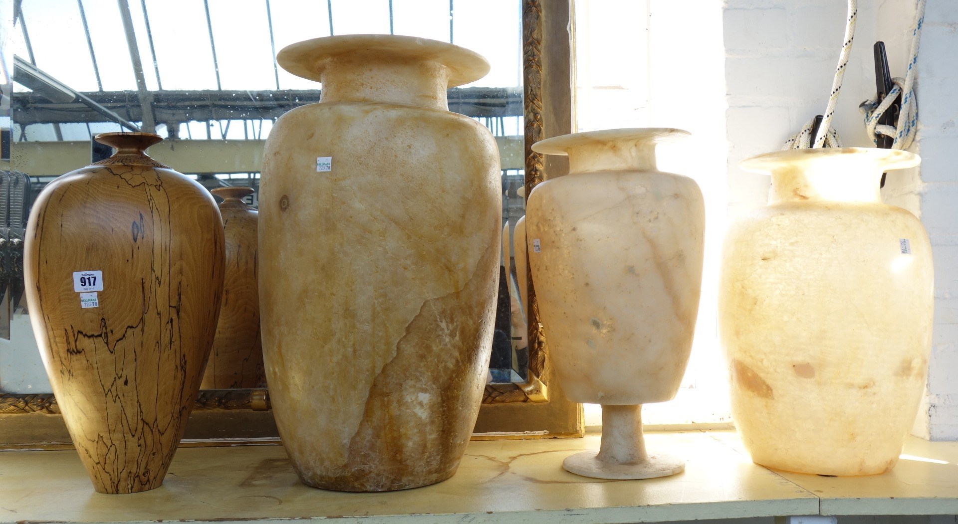 Appraisal: A spalted beech turned and carved vase of ovoid form