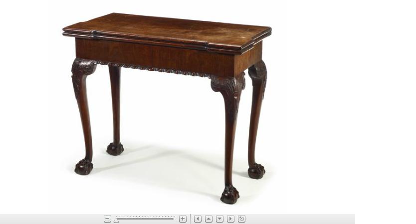 Appraisal: George III mahogany games table the rectangular folding top with