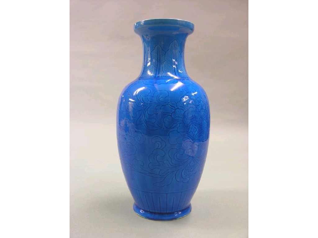 Appraisal: A Chinese blue-glazed porcelain vase baluster shape carved with chrysanthemum