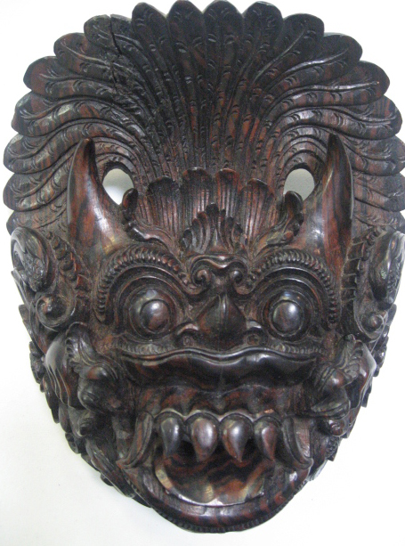 Appraisal: A Japanese Carved Rosewood Demon Mask with well defined feathered