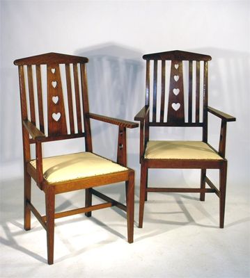 Appraisal: Four Harrods Ltd Arts and Crafts oak chairs with simple