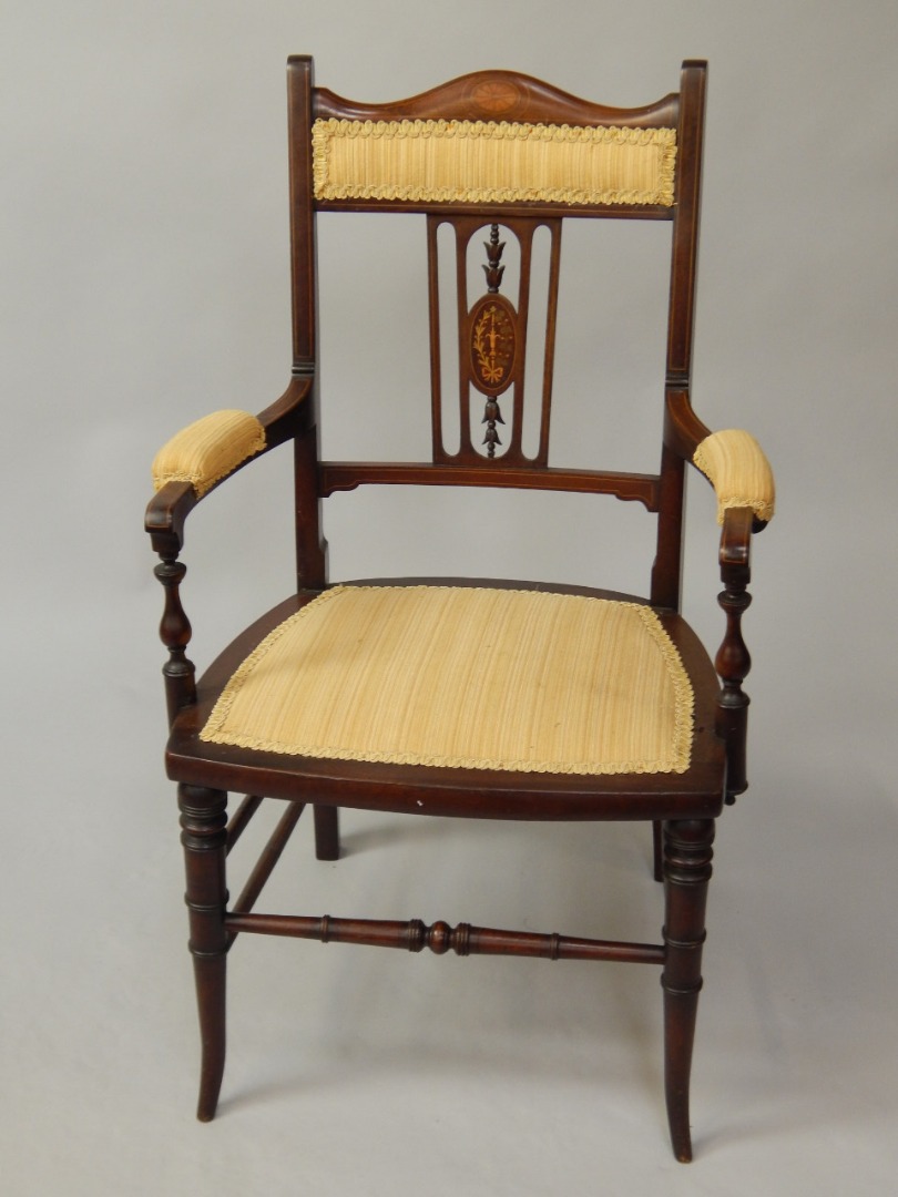 Appraisal: An Edwardian marquetry salon chair with string inlay and open