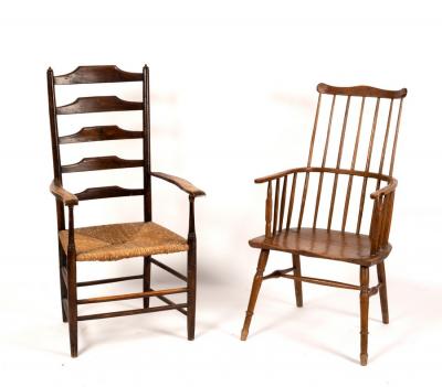 Appraisal: A comb back chair with shaped seat and turned legs