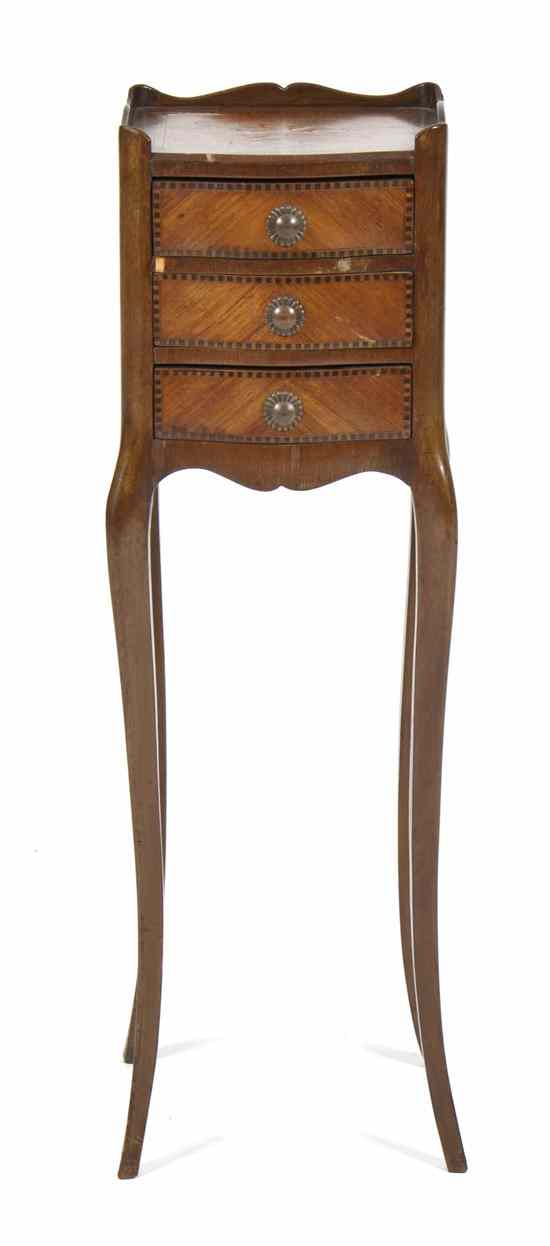 Appraisal: A Continental Marquetry Diminutive Side Table having a shaped galleried