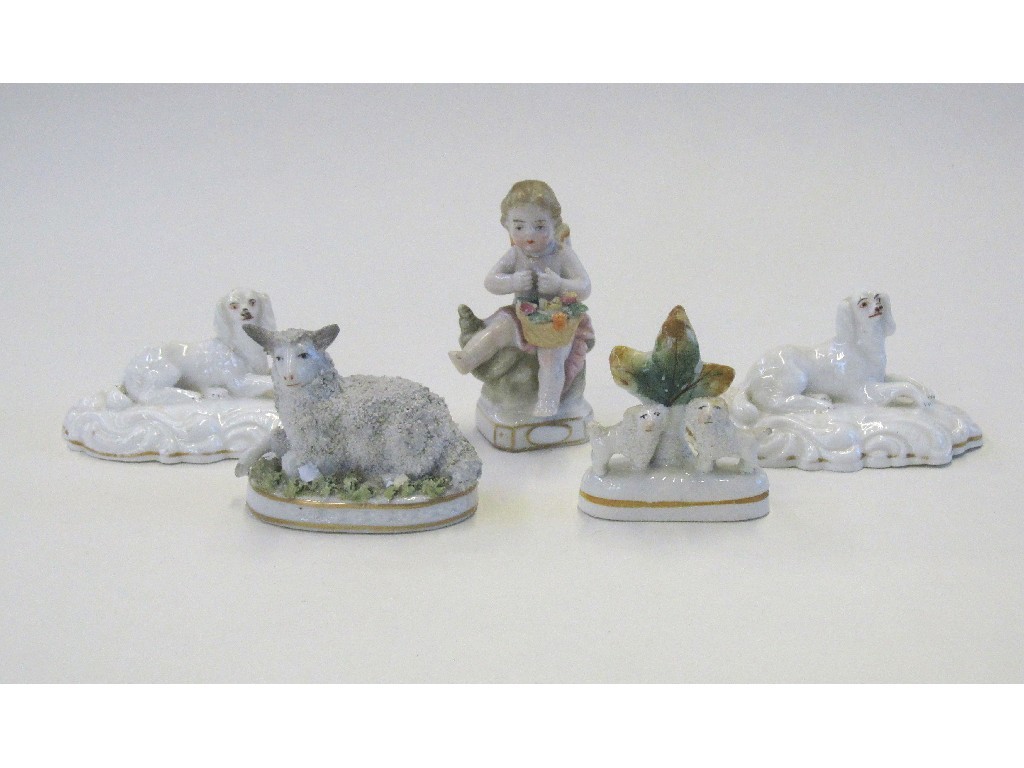 Appraisal: Three small Staffordshire figures of dogs another of a sheep