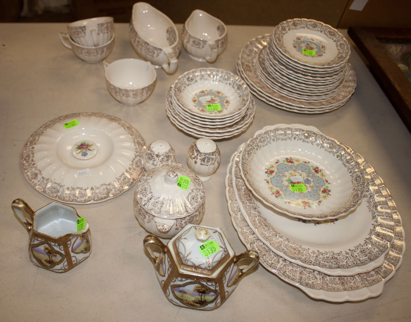 Appraisal: Limoges partial dinner service includes Nippon creamer and sugar