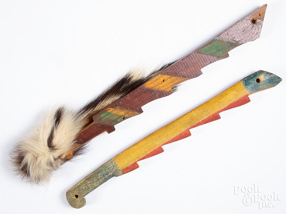 Appraisal: Two plains Indians painted quirt handles Two plains Indians painted