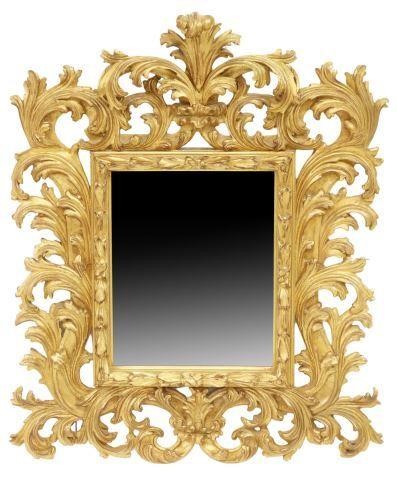 Appraisal: Baroque style giltwood wall mirror Carvers' Guild th c carved