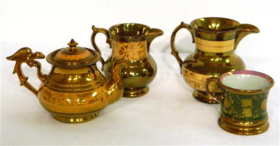 Appraisal: Four pieces of copper lustre including a teapot with bird