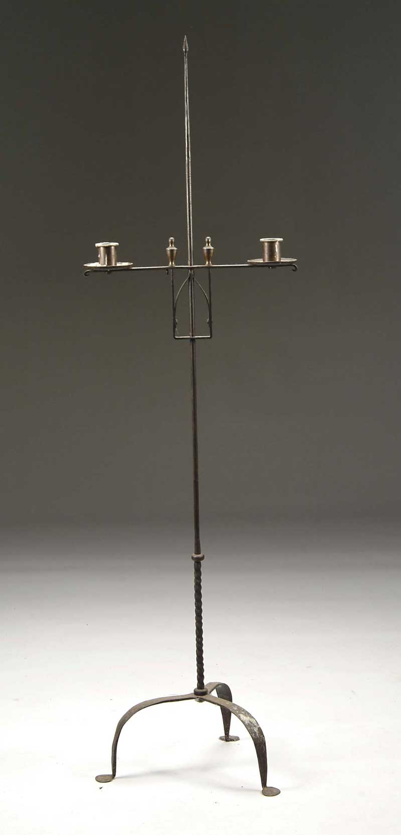 Appraisal: IRON AND BRASS DOUBLE ADJUSTABLE FLOOR CANDLE HOLDER The central