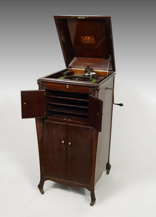 Appraisal: VICTOR VICTROLA VV XI WITH RECORDS Floor model mahogany veneer