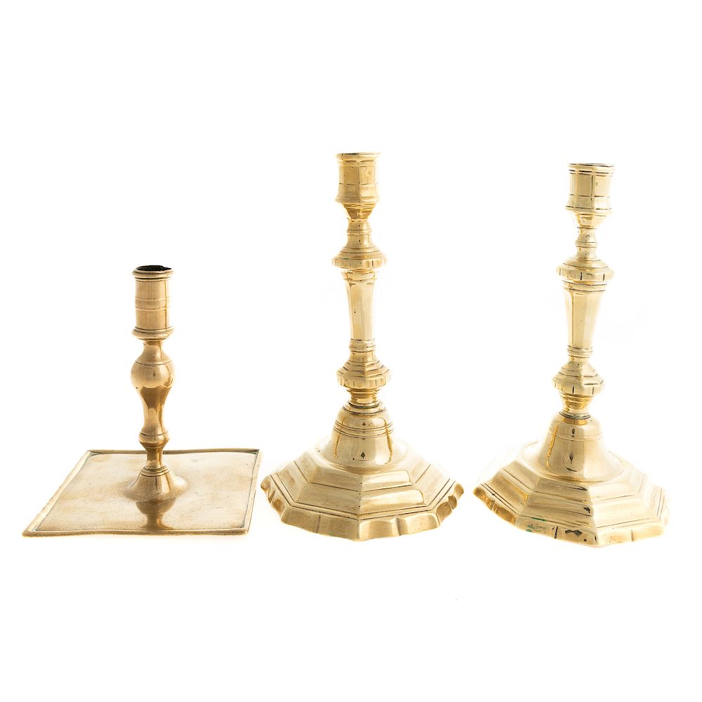 Appraisal: Three Brass Candlesticks th century pair of French Huguenot brass