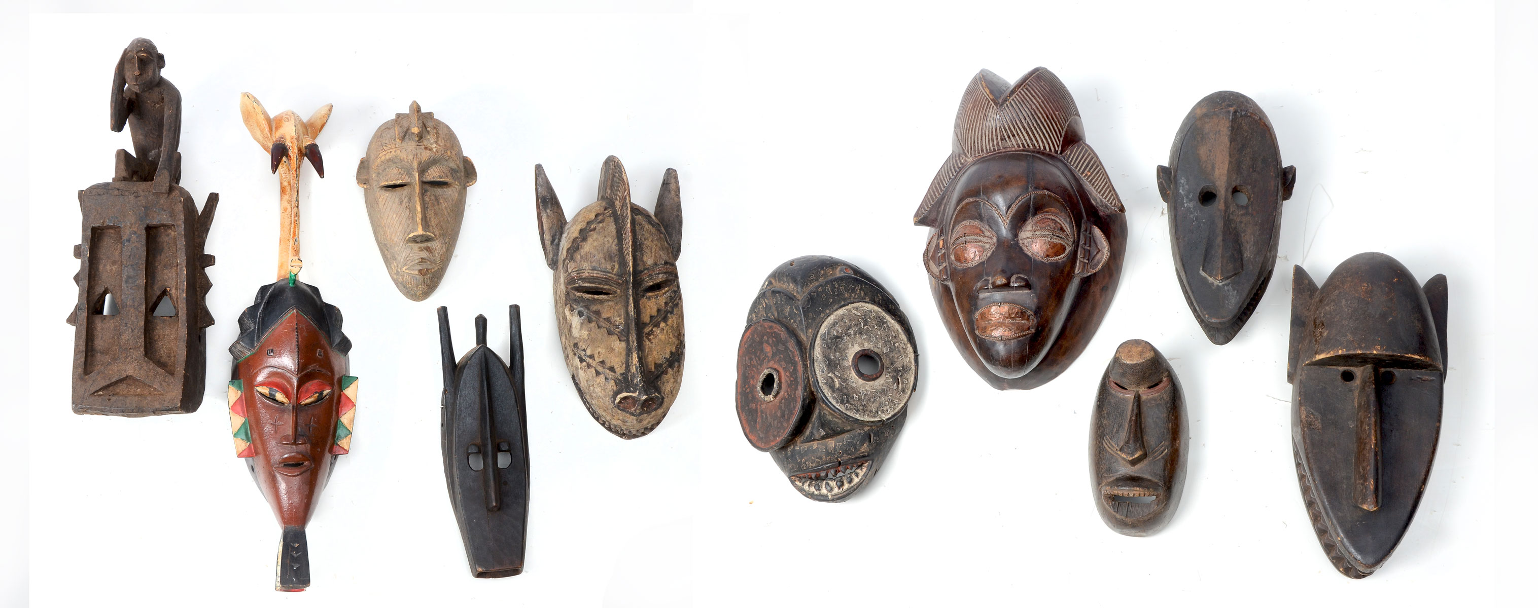 Appraisal: PC AFRICAN CARVED MASK COLLECTION hand carved African masks mainly