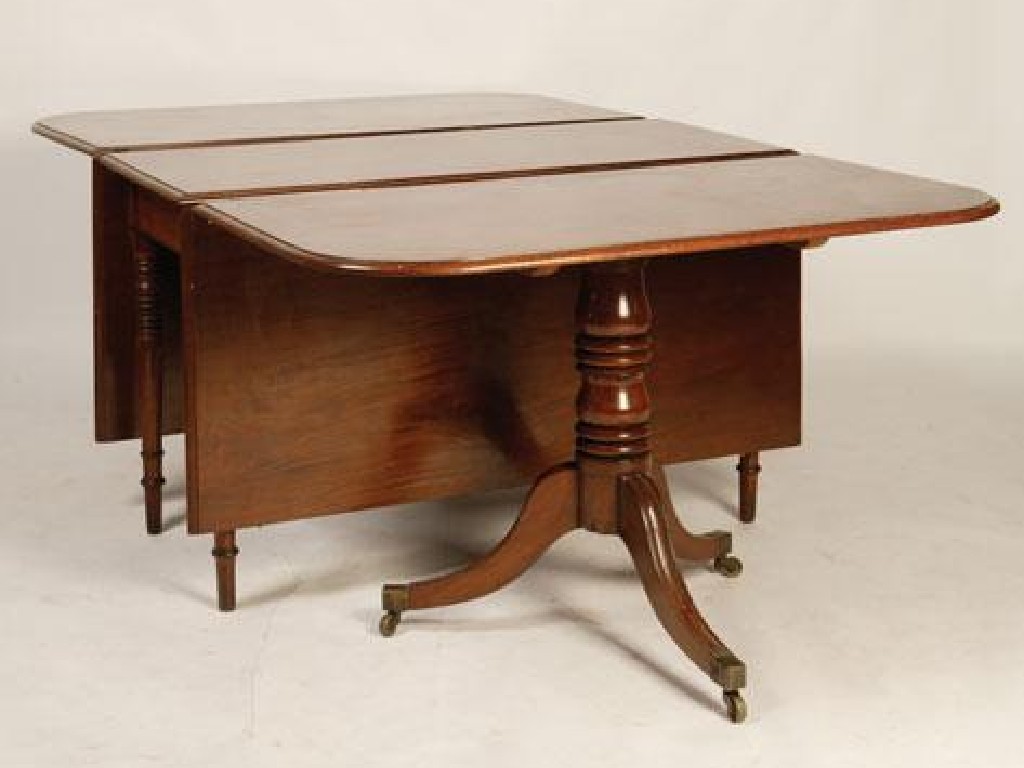 Appraisal: A LATE REGENCY MAHOGANY DINING TABLE the rectangular top with