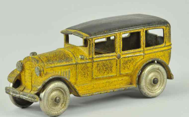 Appraisal: WILLY'S KNIGHT SEDAN Kenton cast iron yellow color version nickel