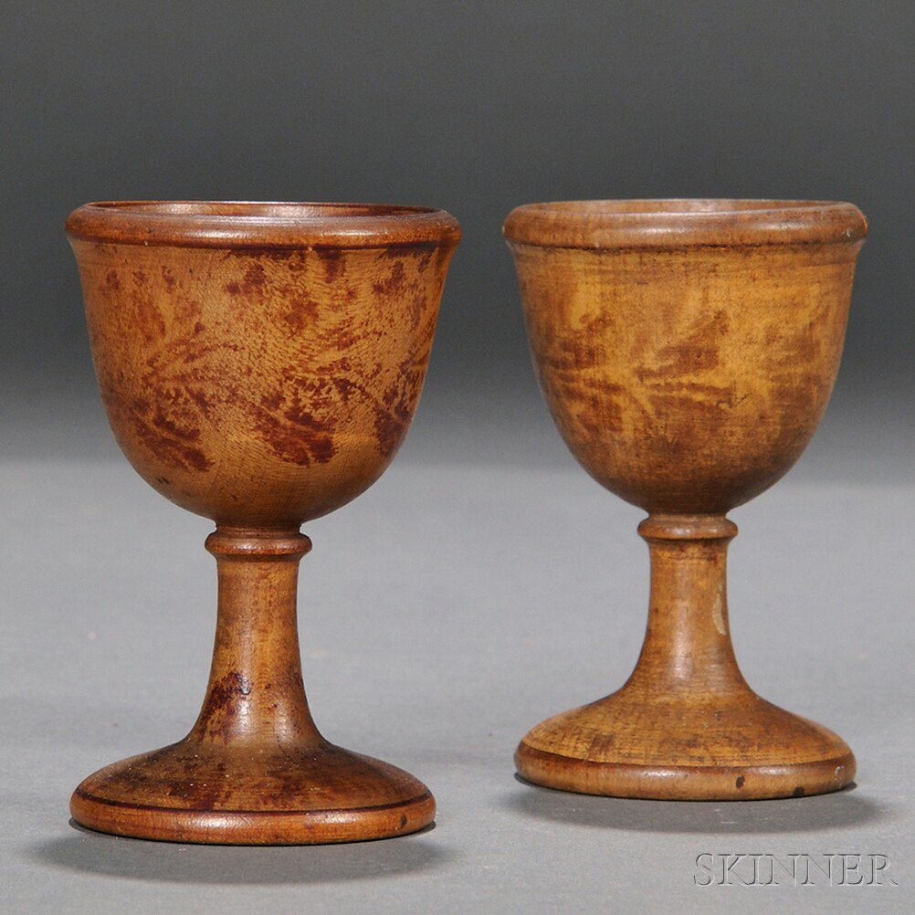 Appraisal: Pair of Turned Maple Egg Cups America early th century