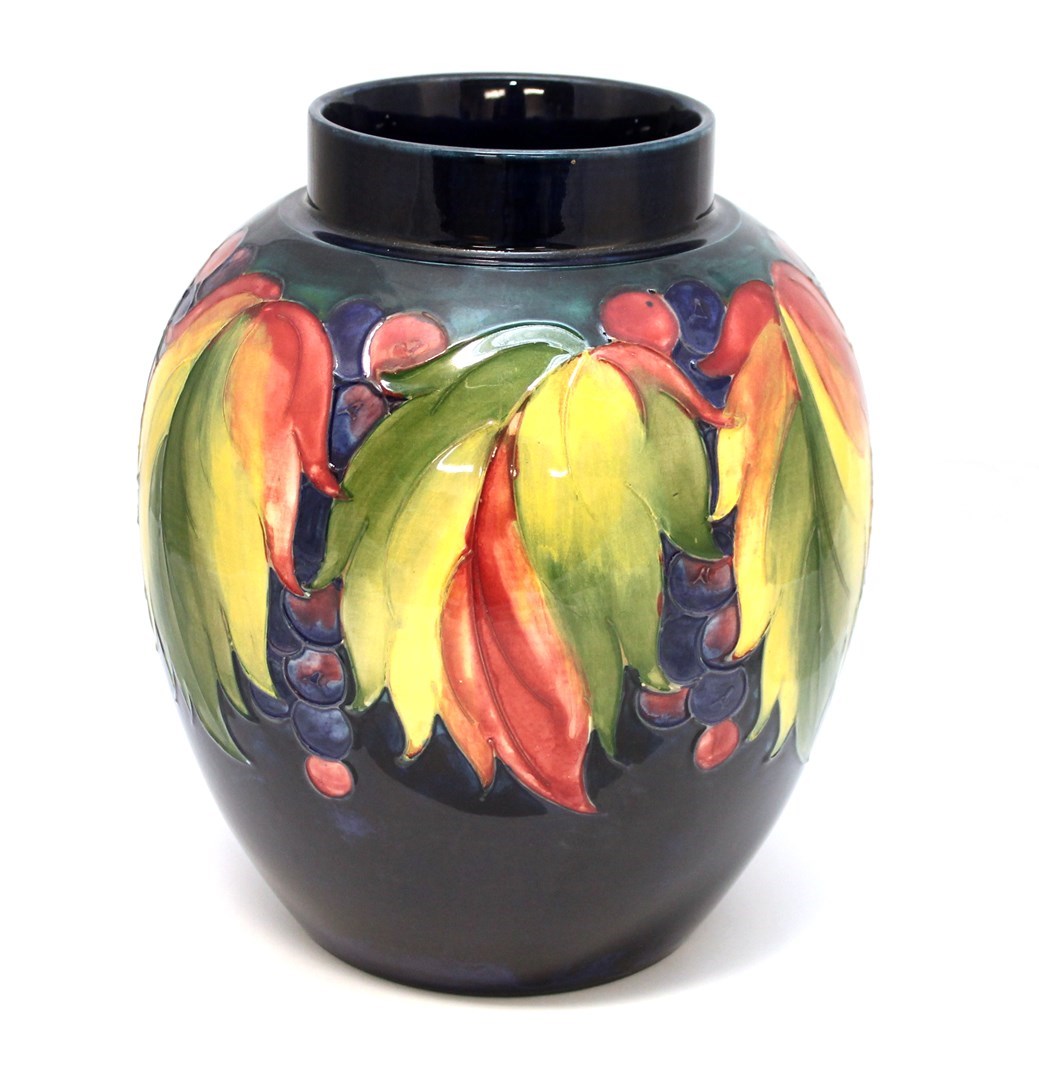 Appraisal: A Moorcroft vase decorated in the leaf and grape pattern