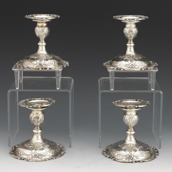 Appraisal: FOUR DURHAM SILVER CO STERLING SILVER BAROQUE STYLE CANDLEHOLDERS CA