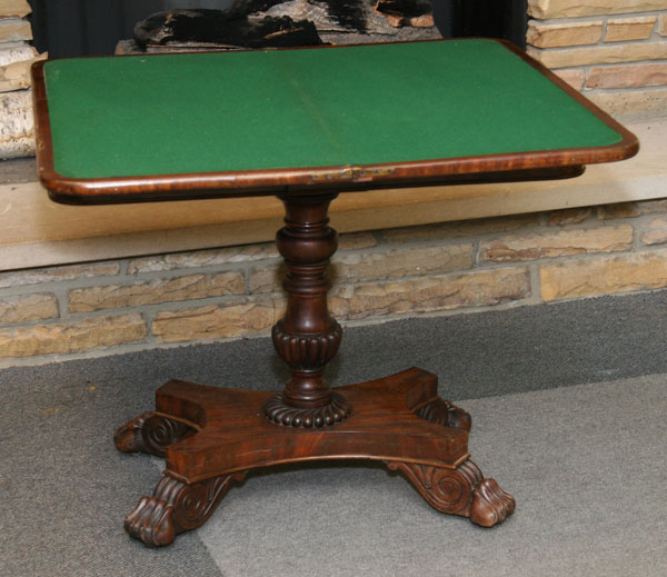 Appraisal: Mahogany tilt top game table th century Federal style turned