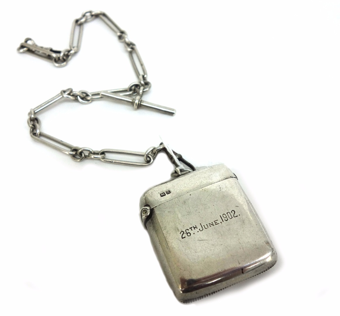 Appraisal: An Edwardian silver vesta case Chester inscribed to a silver