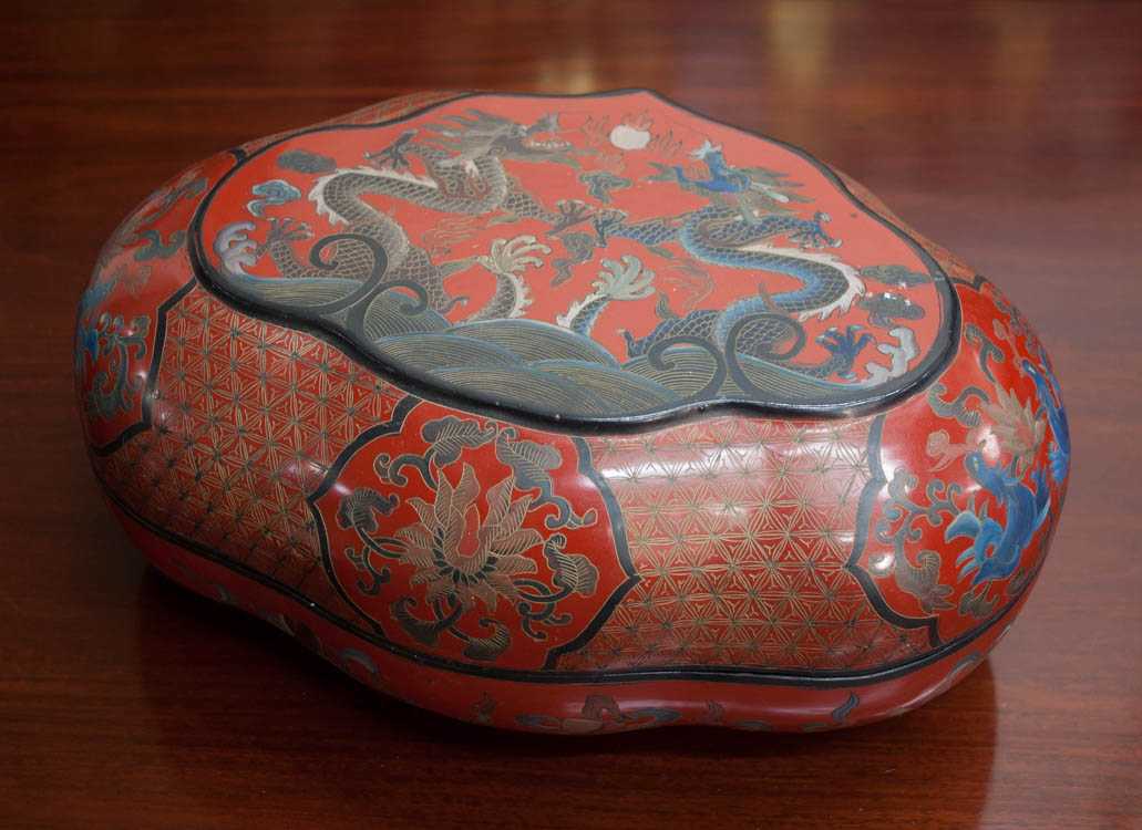 Appraisal: CHINESE LACQUERED LIDDED BOX with five-toed dragon decoration six-character mark