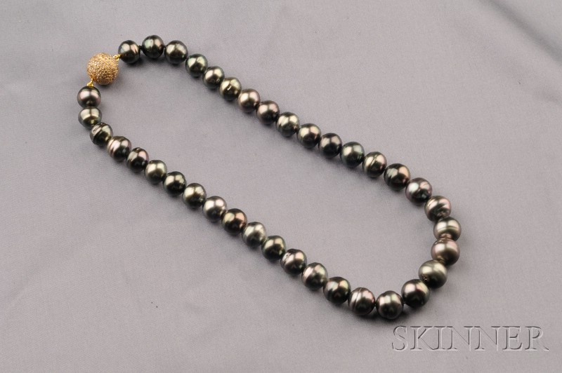 Appraisal: Tahitian Pearl Necklace composed of thirty-seven semi-baroque pearls graduating slightly