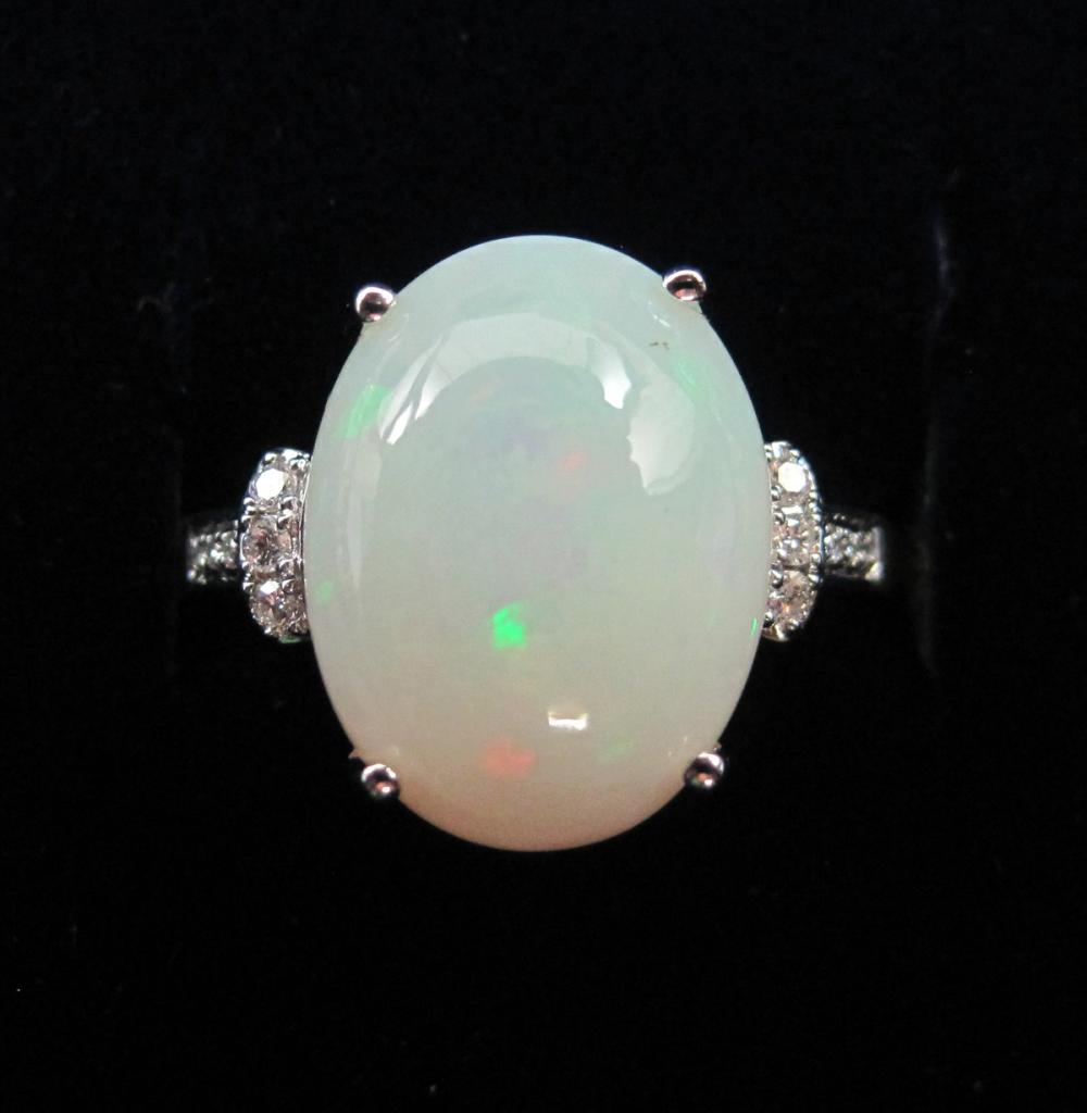 Appraisal: OPAL DIAMOND AND EIGHTEEN KARAT WHITE GOLD RING with six