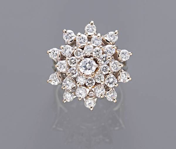 Appraisal: A diamond cluster ring estimated total diamond weight carats mounted