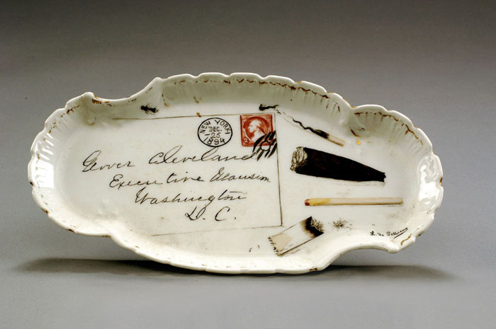 Appraisal: LIMOGES PORCELAIN PAINTED TROMPE L'OEIL ASHTRAY OF PRESIDENTIAL INTEREST MARTIAL