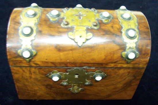 Appraisal: A late th Century figured walnut box the domed cover